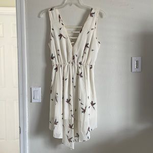 Asymmetrical dress, spaghetti’s traps and birds design